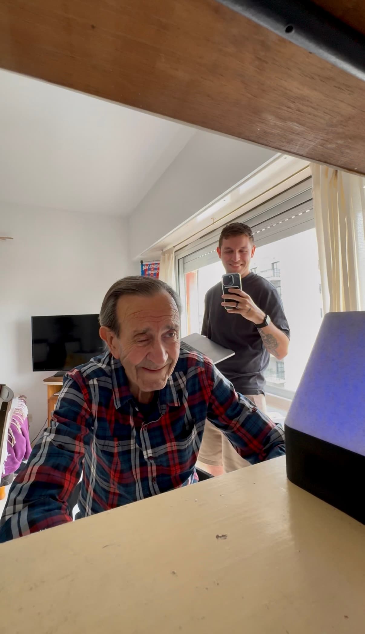 Ato screen-free AI device for seniors, a compact voice companion on a table